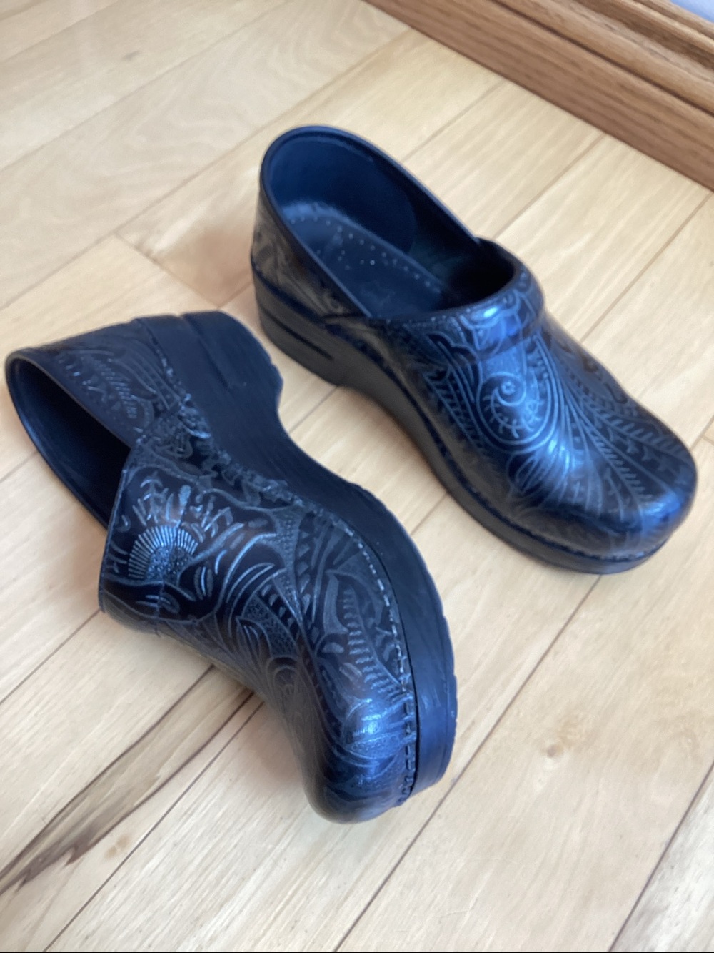 Dansko black tooled leather professional clogs. Women’s size 38 (7.5-8)